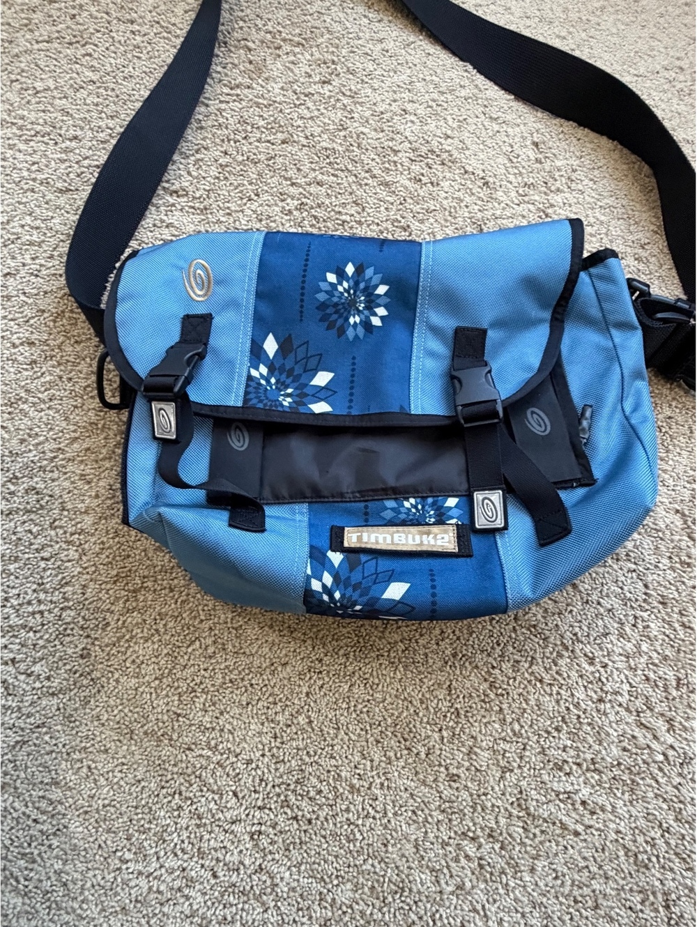 Men's blue Timbuk2 messenger bag  floral pattern black shoulder strap